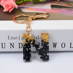 Carsine Black Pompom 26 Alphabets Keychain gold / N